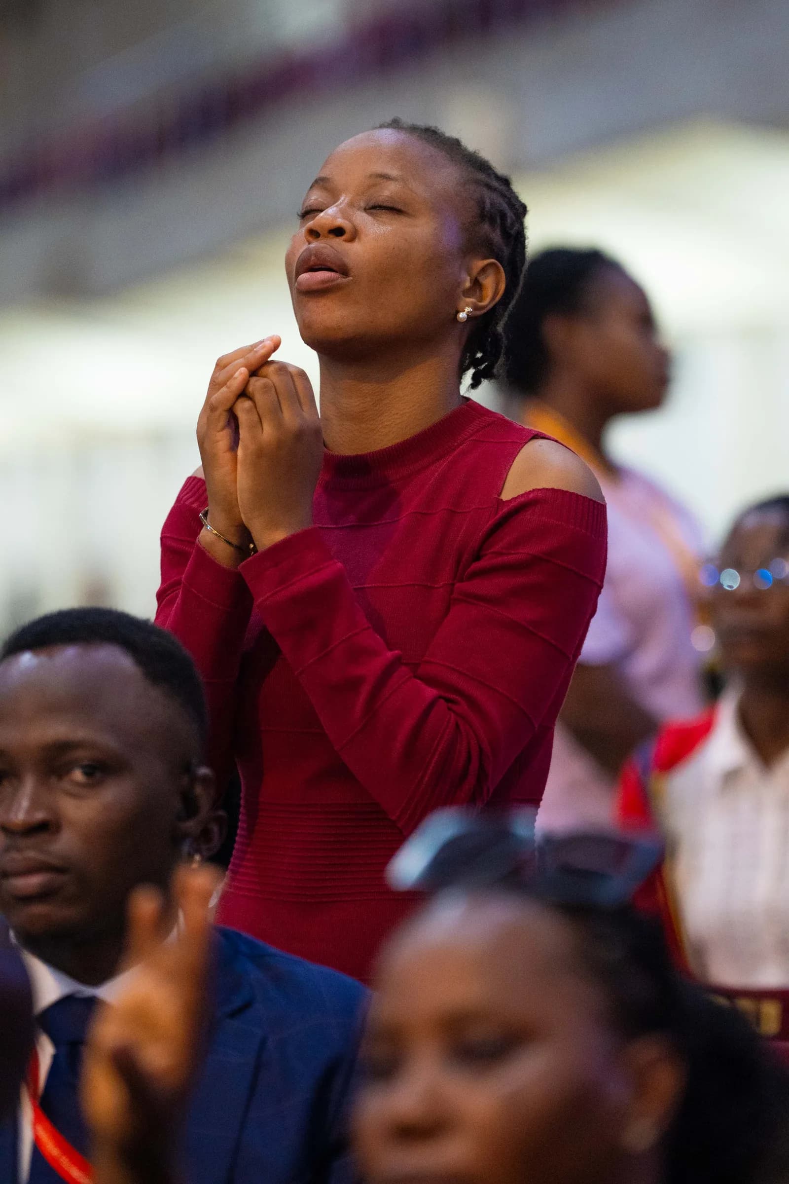 Youth worshipping at AYAC